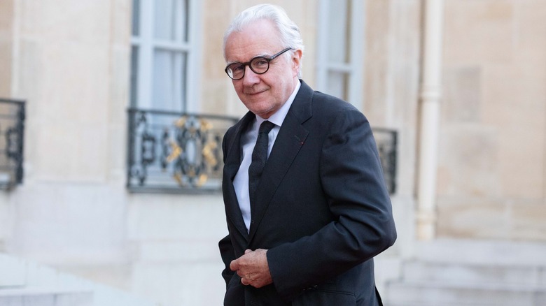 Alain Ducasse smiling with glasses