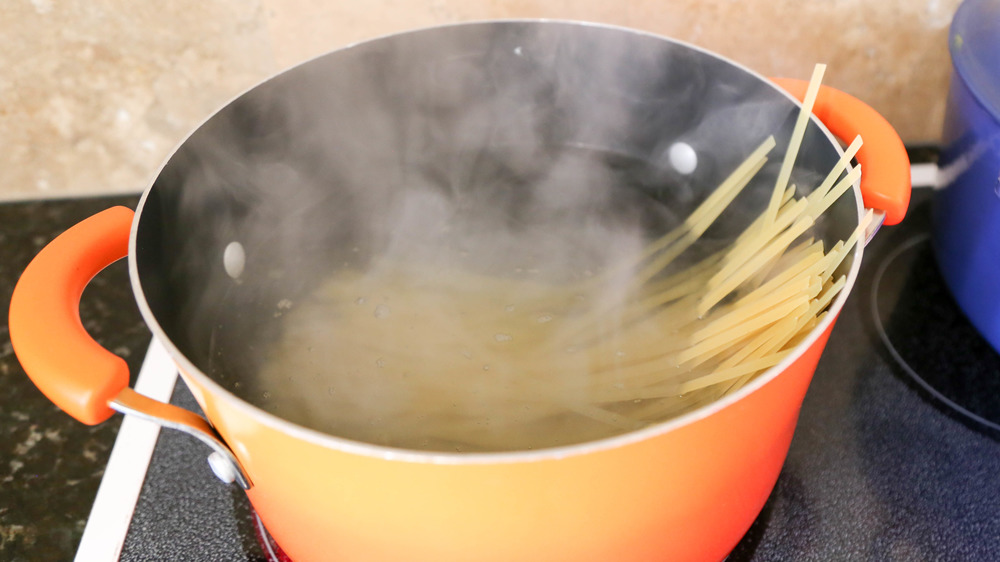 pasta in boiling water for fettuccine Alfredo recipe