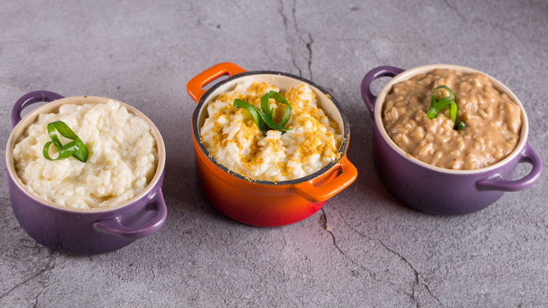 Assorted risottos in colorful pots