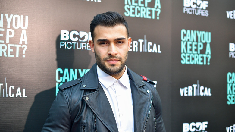 Sam Asghari sporting leather jacket