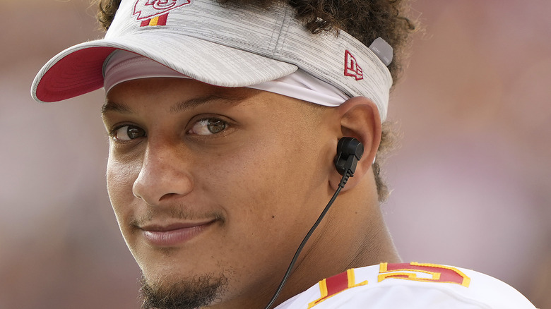 Patrick Mahomes wearing a KC visor