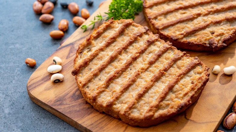 Grilled vegan steaks on wood