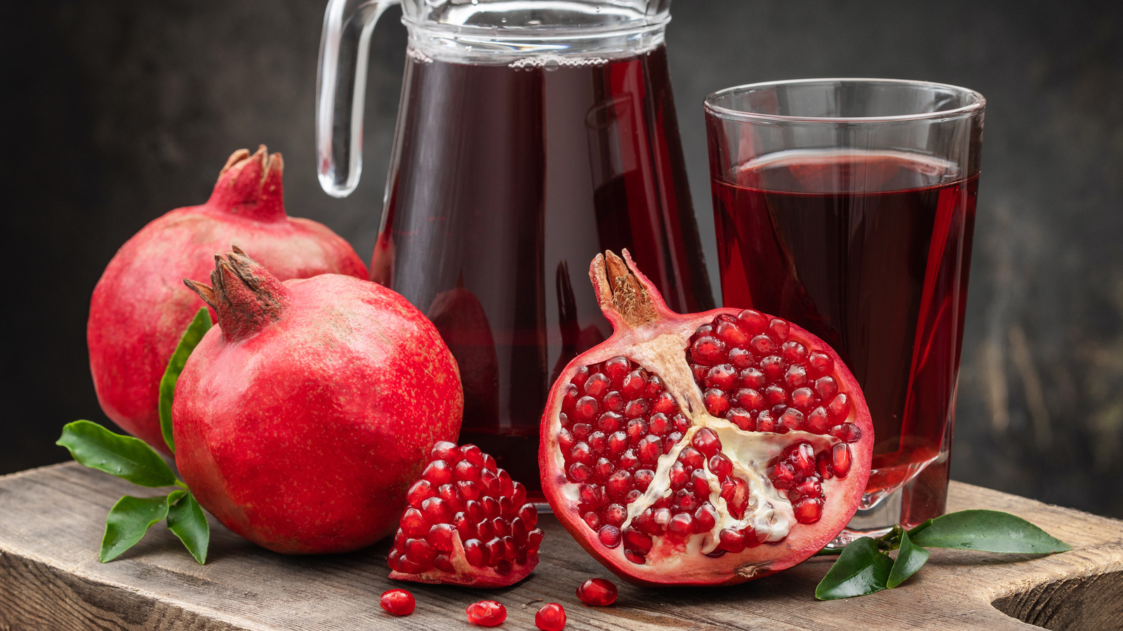 Can opener and pomegranate - open pomegranate for juice Stock Photo