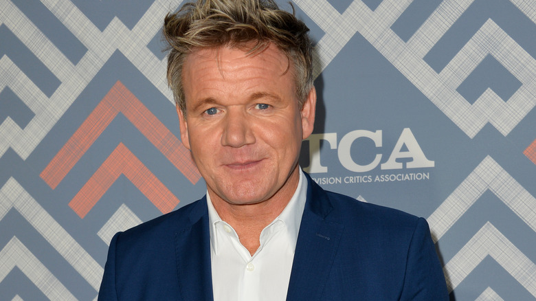 Gordon Ramsay in white shirt and blue blazer