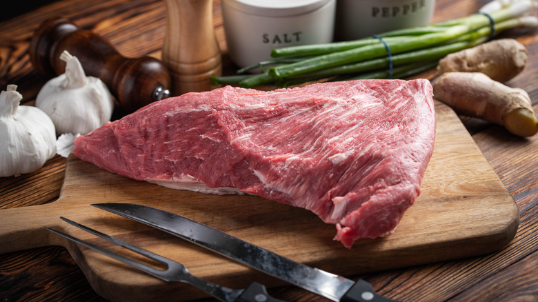 tri tip on cutting board