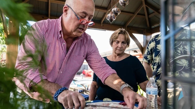 Andrew Zimmern cooking