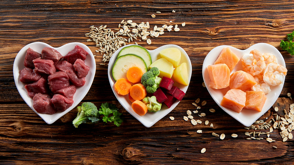 Various ingredients in heart-shaped bowls.