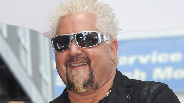 Guy Fieri close-up wearing sunglasses