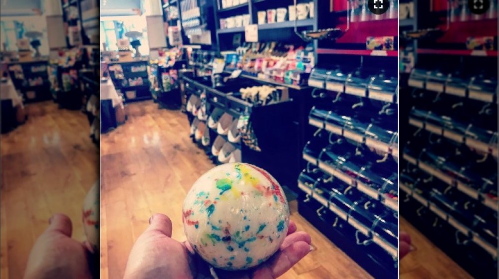 hand holding jawbreaker candy