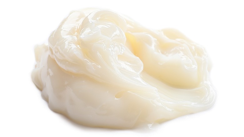 Dollop of lard on a white background