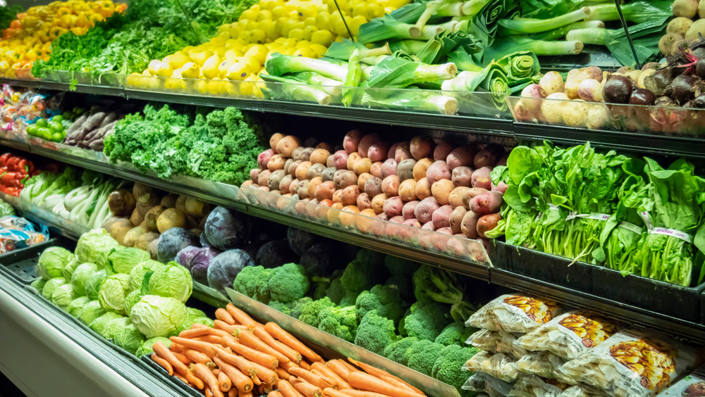 A fresh produce aisle in a grocery store