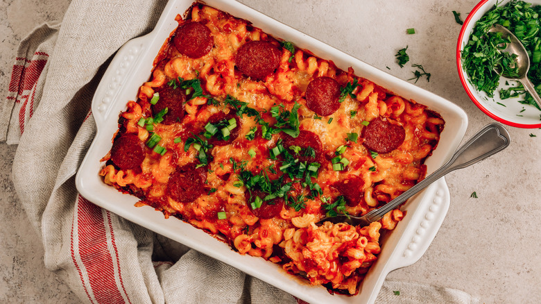 pepperoni casserole in a white casserole dish