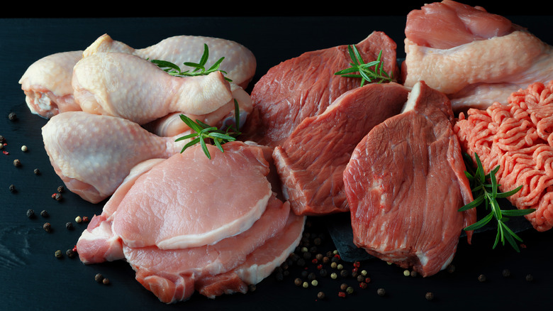 Raw chicken, beef, and pork