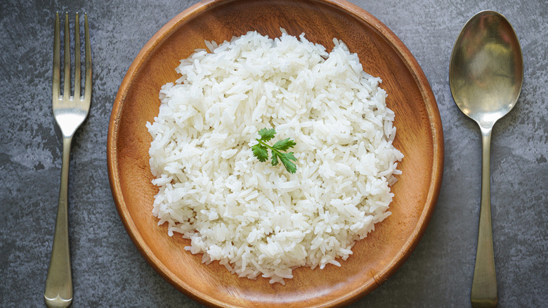 Wood bowl of white rice