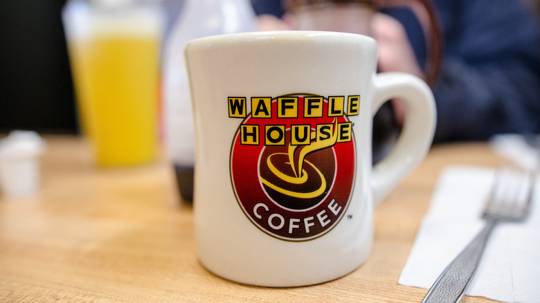 Close-up coffee mug that says Waffle House 