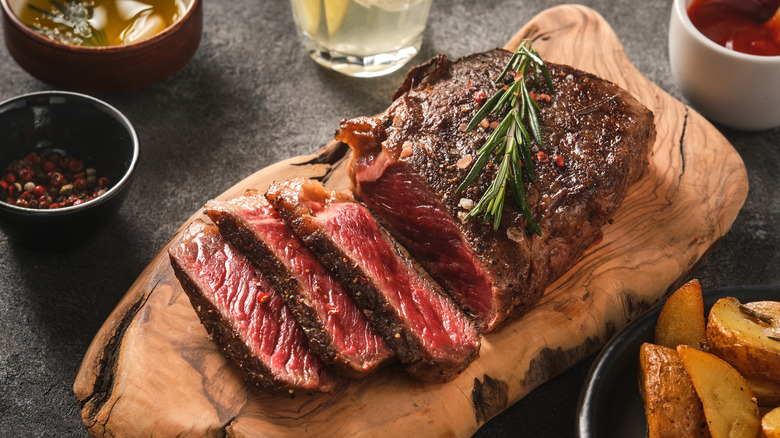 steak sliced with rosemary seasoning and crushed pepper