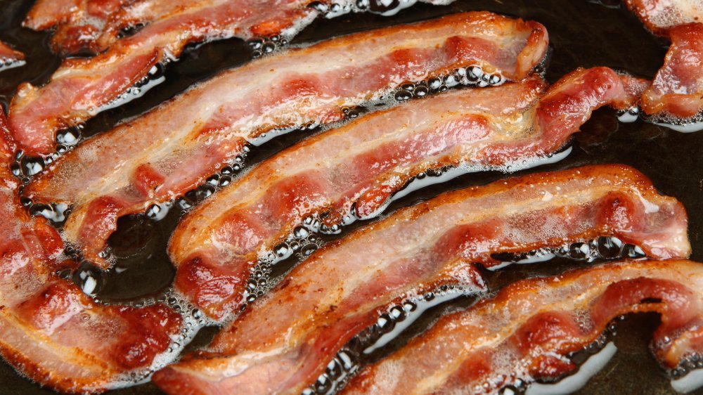 Strips of bacon rendering