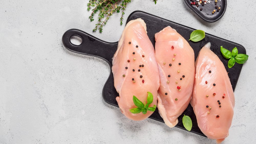 Chicken breast on a cutting board