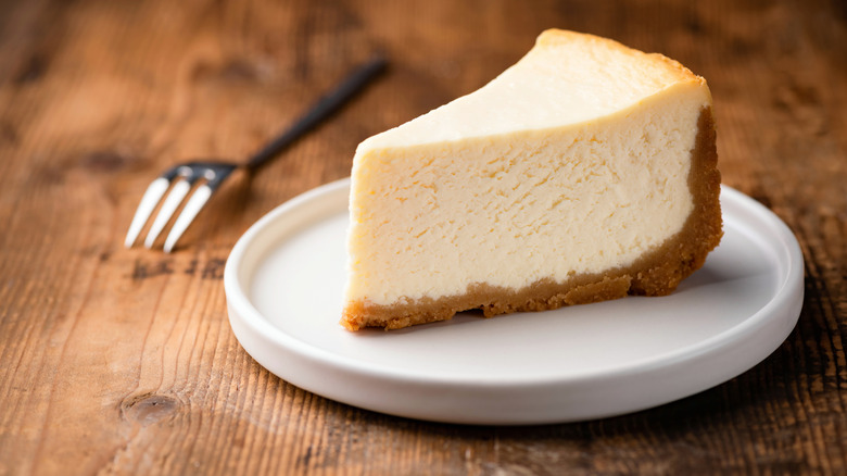 A slice of cheesecake on a plate