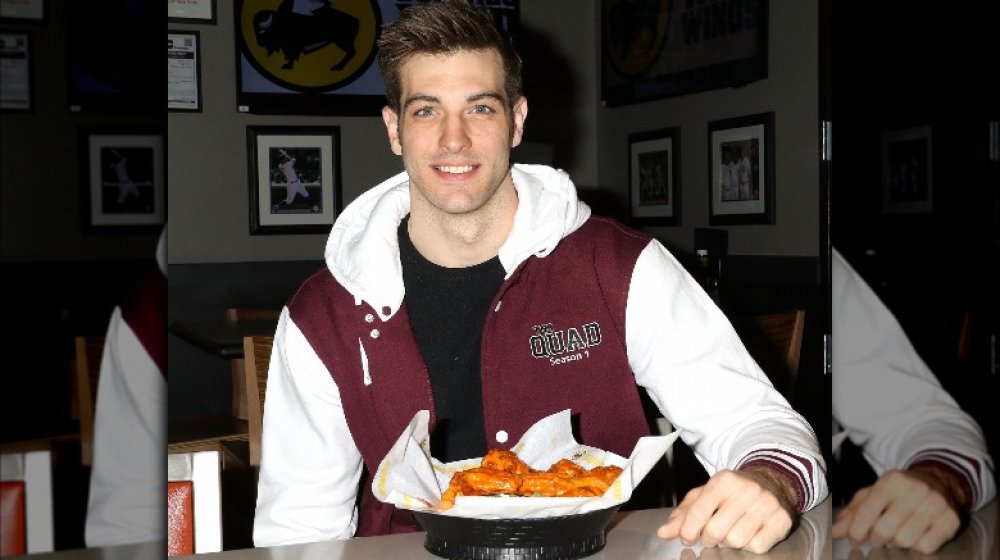 Jake Allyn at Buffalo Wild Wings, with chicken wings