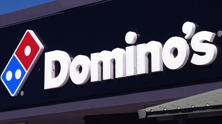 Domino's storefront logo sign