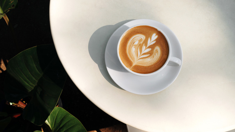 latte on a table with latte art