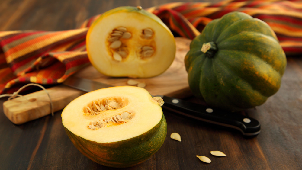 whole and halved acorn squash