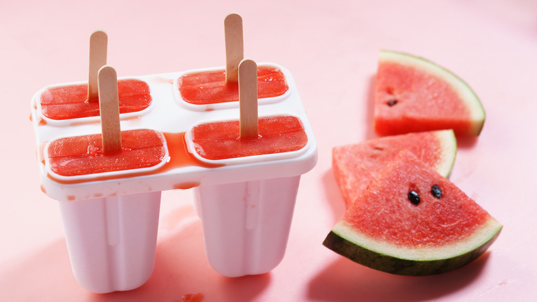 Watermelon popsicles and watermelon slices