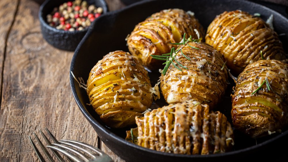 Hasselback potatoes in cast iron pan