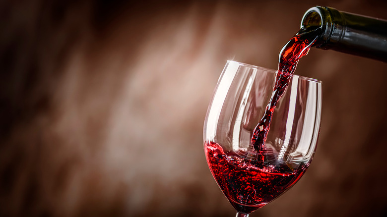 Red wine being poured into glass