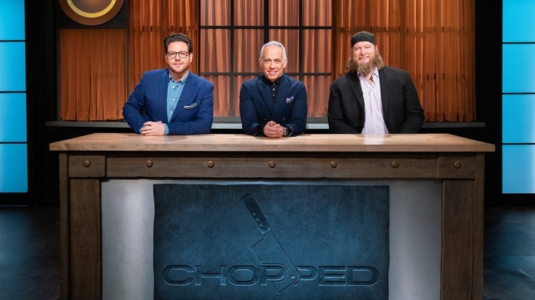 Chopped judges sit at table