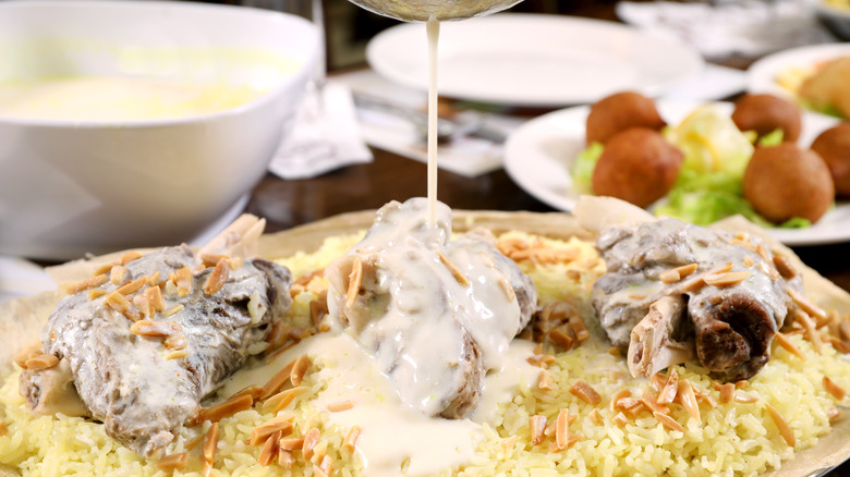 Mansaf over bed of rice