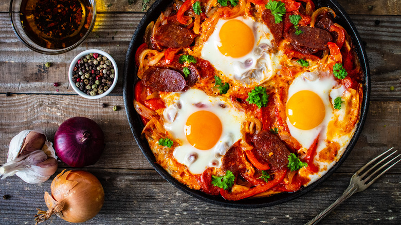 chorizo and eggs in pan