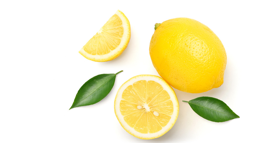 sliced lemon on white background