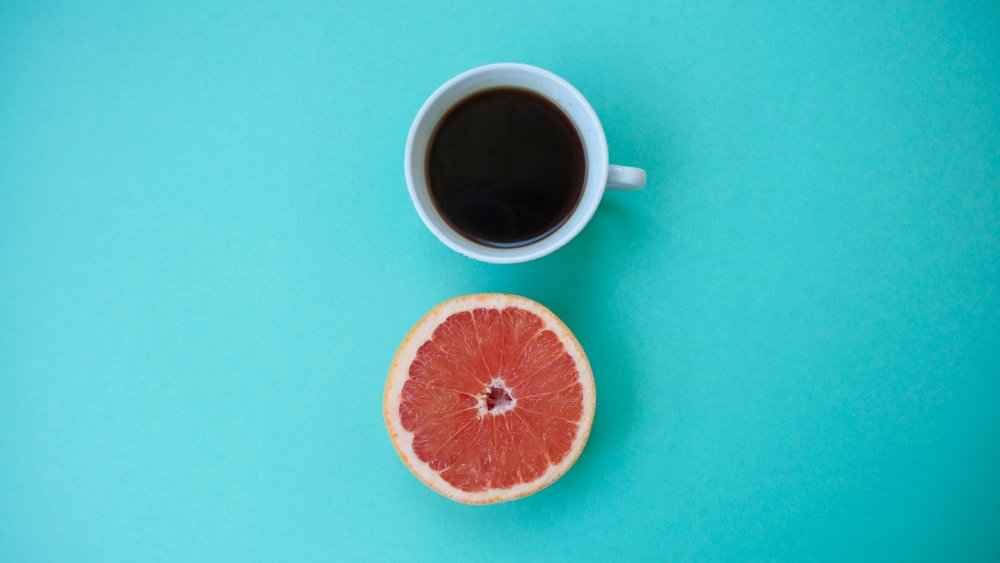 Cup of coffee and grapefruit