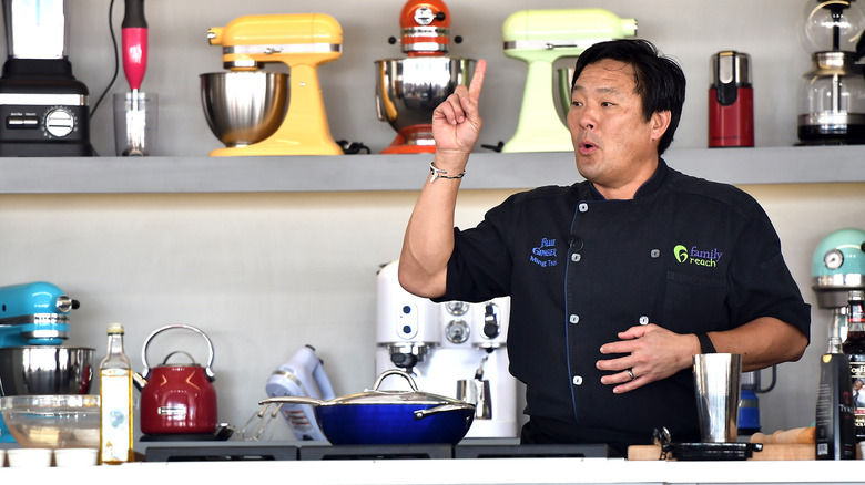 Ming Tsai in a kitchen