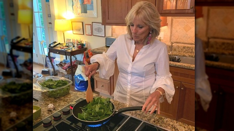 Jill Biden sauteeing spinach