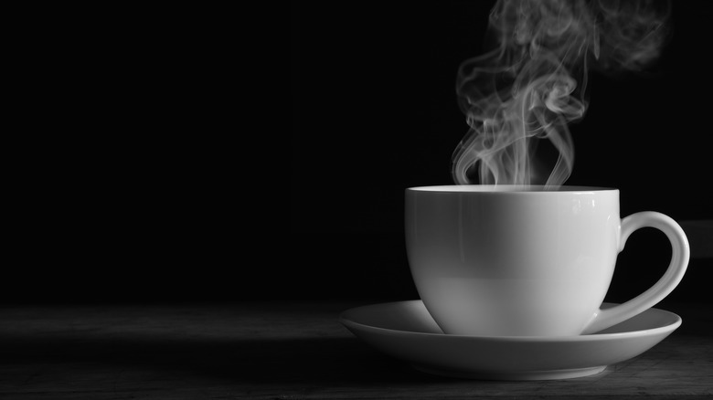 Mug of steaming coffee