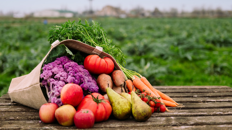 Basket overflowing with fruits and vegetables