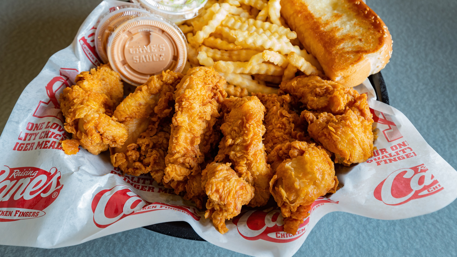 This Is What Makes Raising Cane's Chicken So Delicious Exclusive