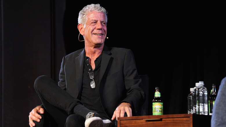 Anthony Bourdain smiling on stage