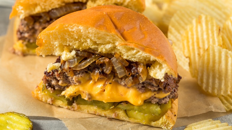 Juicy Lucy cheeseburger with chips