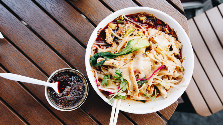 Top down view of a bowl of biang biang noodles