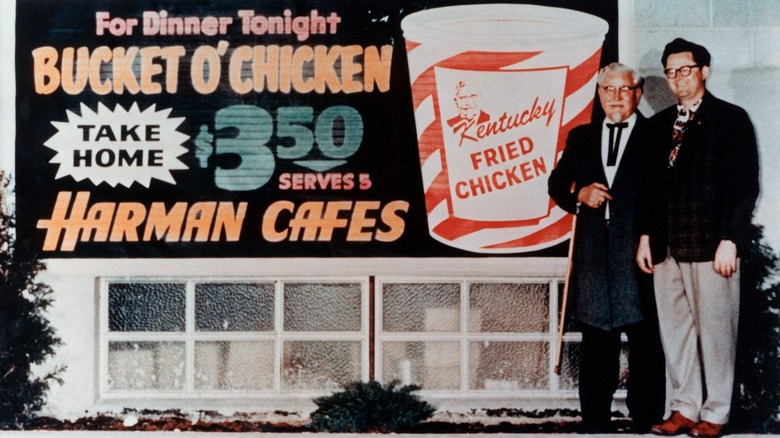 Colonel Sanders and Pete Harman at the first KFC