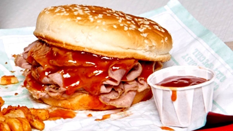 Arby's roast beef sandwich coated in sauce