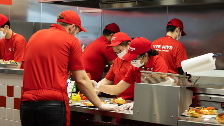 Employees working at Five Guys