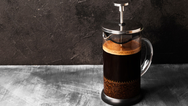 French press filled with coffee