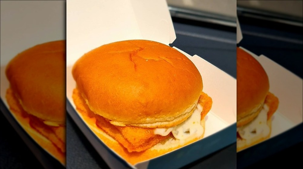 Filet-O-Fish sandwich in a white box