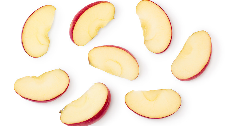 Apple slices on a white background