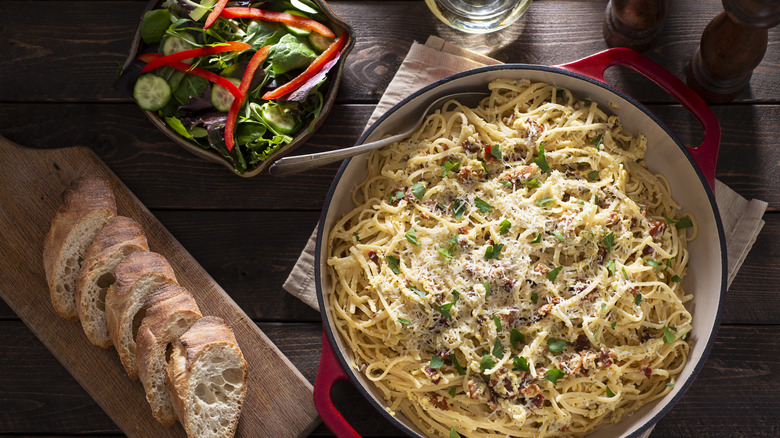 spaghetti carbonara with salad